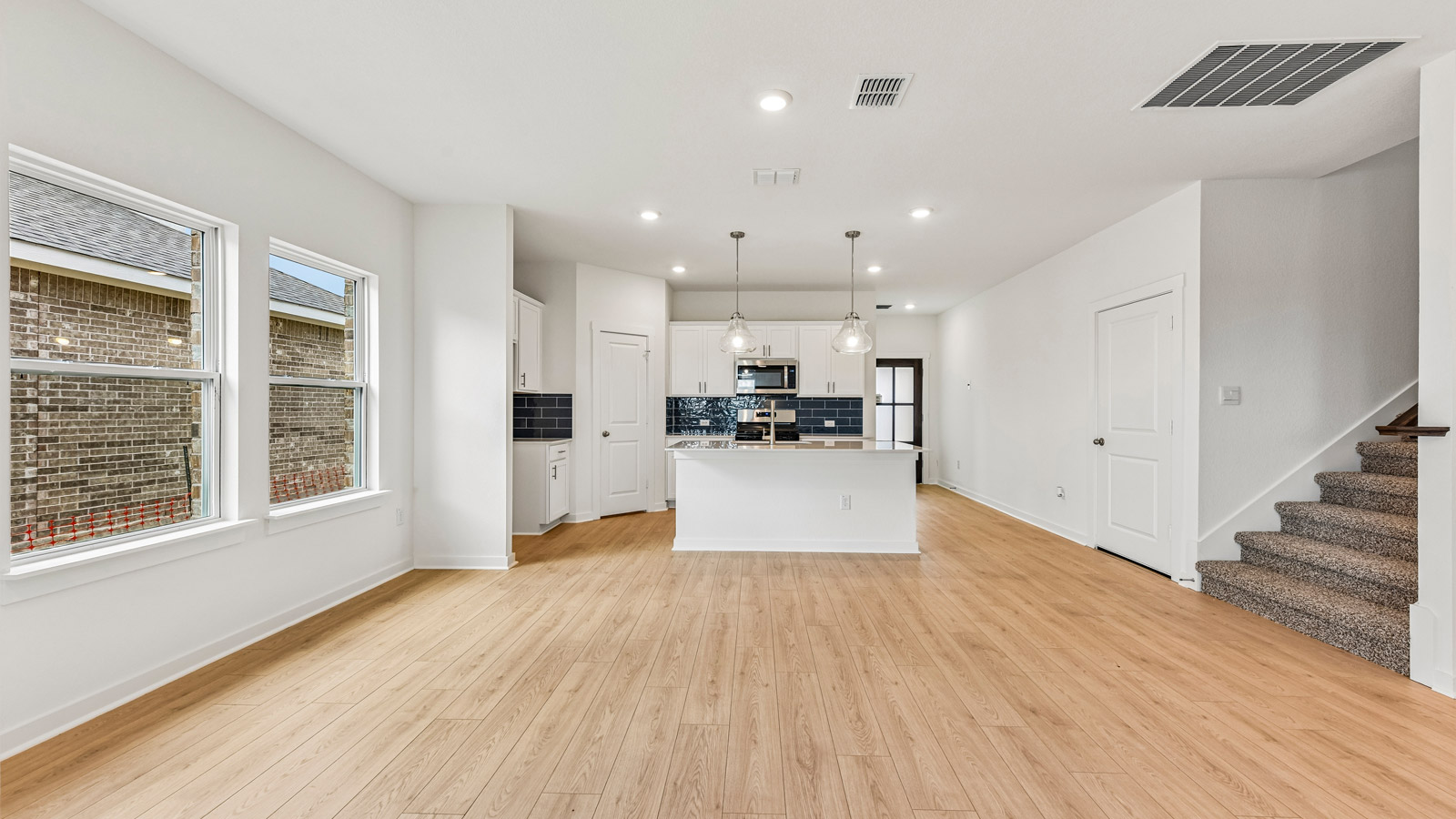 Quincy Open Concept Livingroom with a lot of Natural Lighting