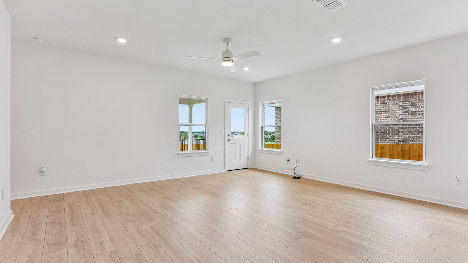 Quincy Open Concept Livingroom with a lot of Natural Lighting