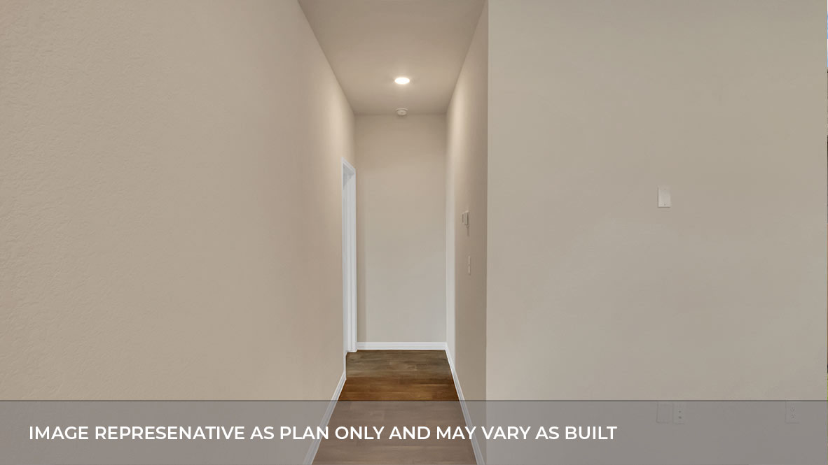 Closer view of hallway with bedrooms down the hall.