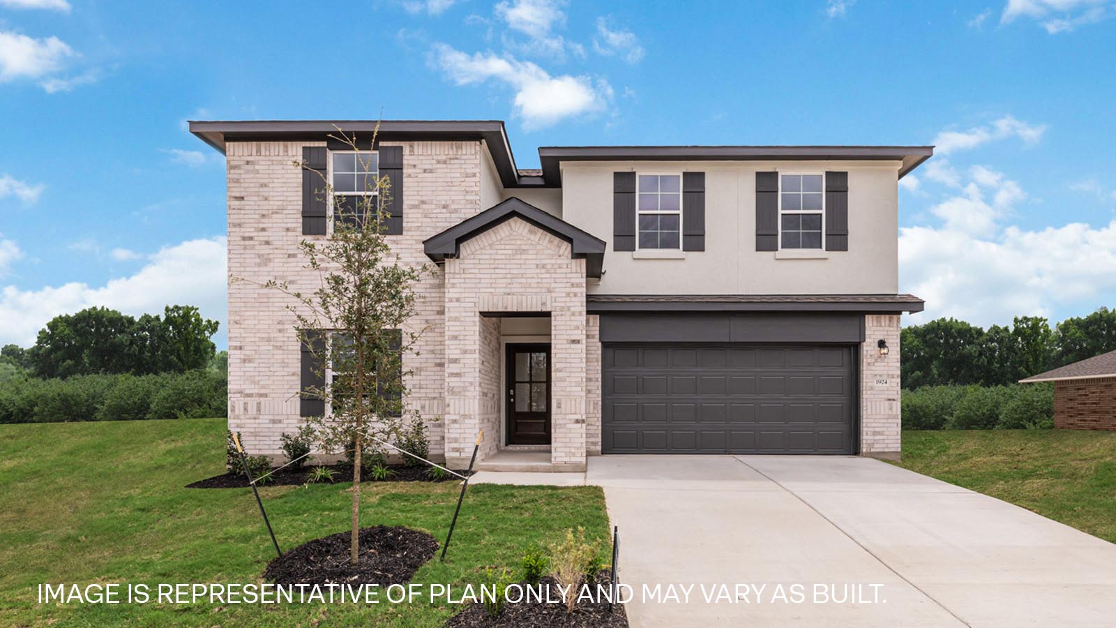 The Quincy floorplan - A Elevation at Rosenbusch Ranch in Leander, TX.