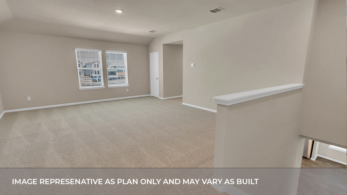 Spacious loft area with hall to bedrooms to the right.