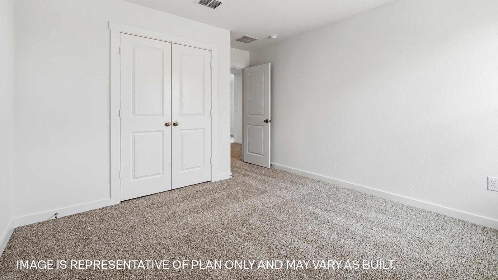 Bedroom 4 with carpeted flooring.