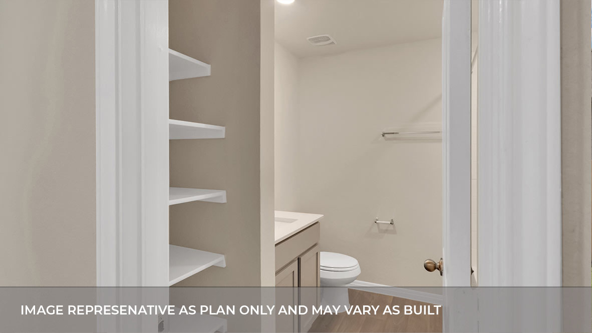 Bathroom with single sink light gray vanity and light tan granite tops with white tile shower and tub combo.
