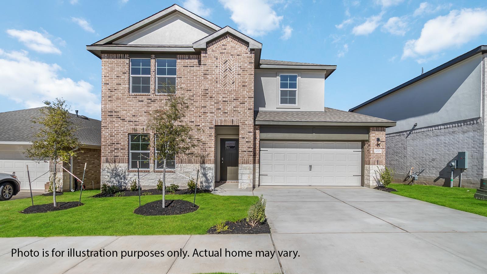 Front exterior two story Rosemont home with light tan brick, white paneling, and white siding with white two-car garage and driveway in the front with white shutters on the windows.