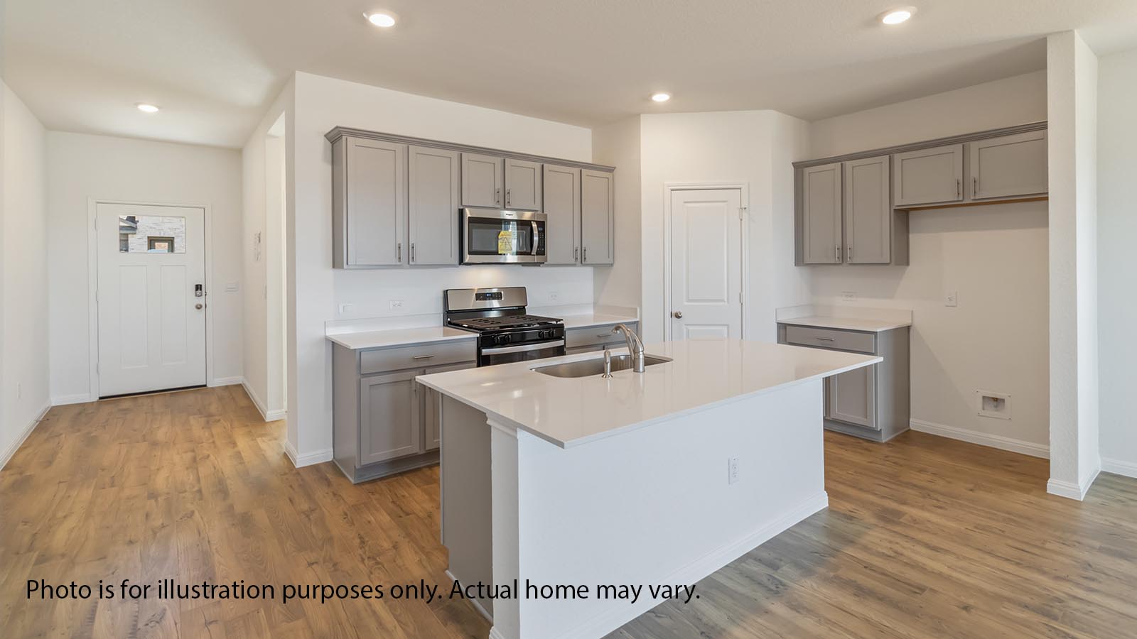 Kitchen with island, gray cabiets, LVP floors