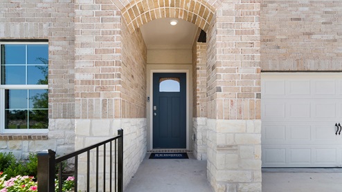 Discover your new home at Rosenbusch Ranch Covered Brick Entry