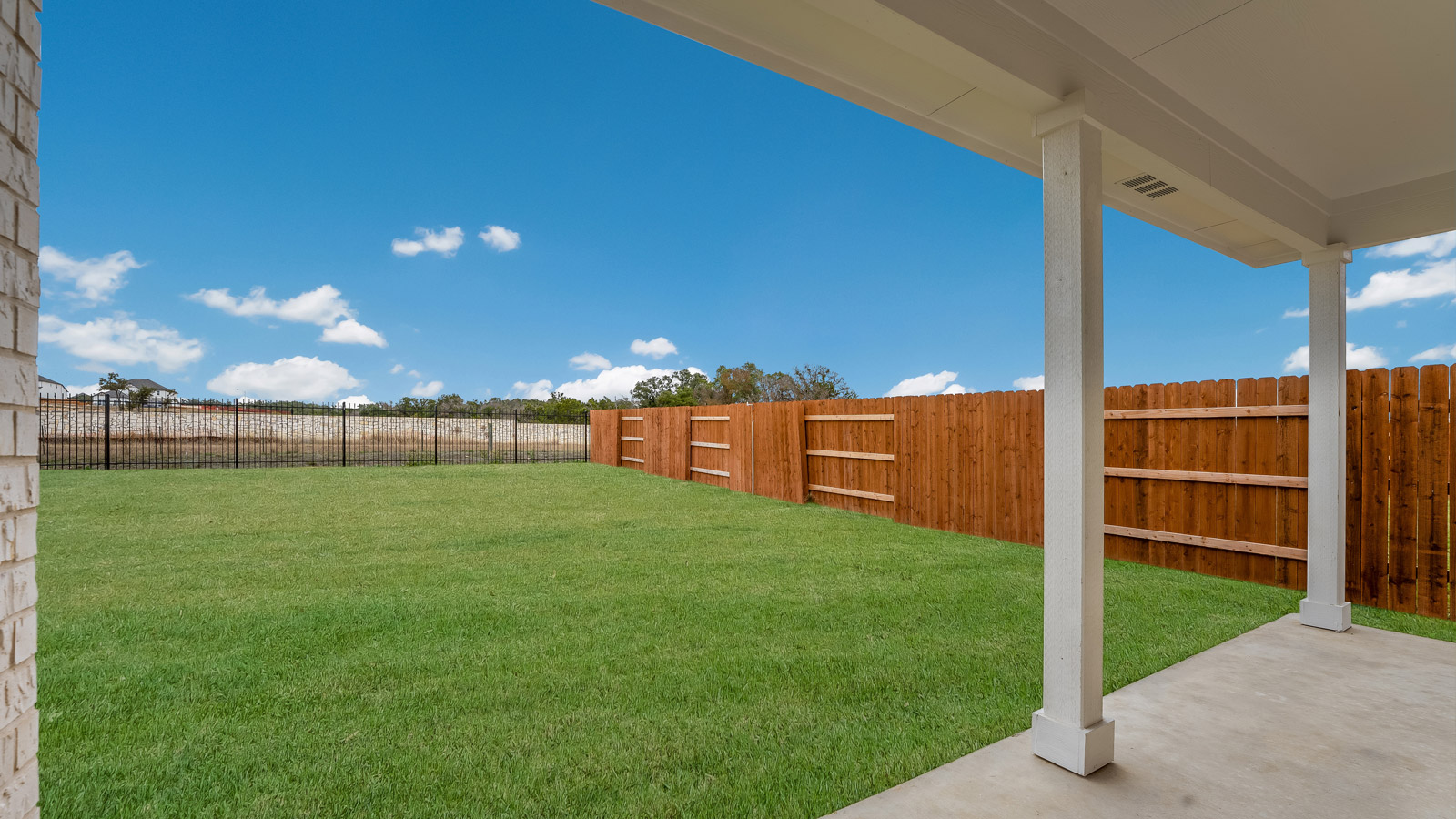 Large backyard of 120 Bruin Paw Drive at Riverview in Georgetown, TX.