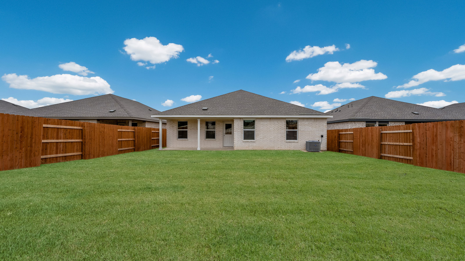 Large backyard of 120 Bruin Paw Drive at Riverview in Georgetown, TX.
