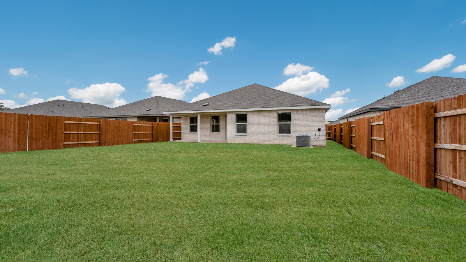 Large backyard of 120 Bruin Paw Drive at Riverview in Georgetown, TX.