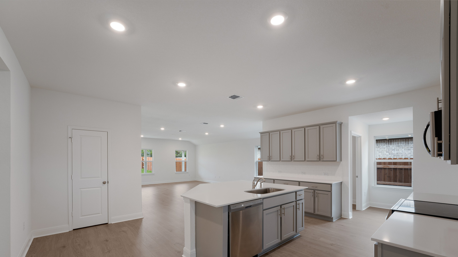 Gourmet kitchen with oversized kitchen island.