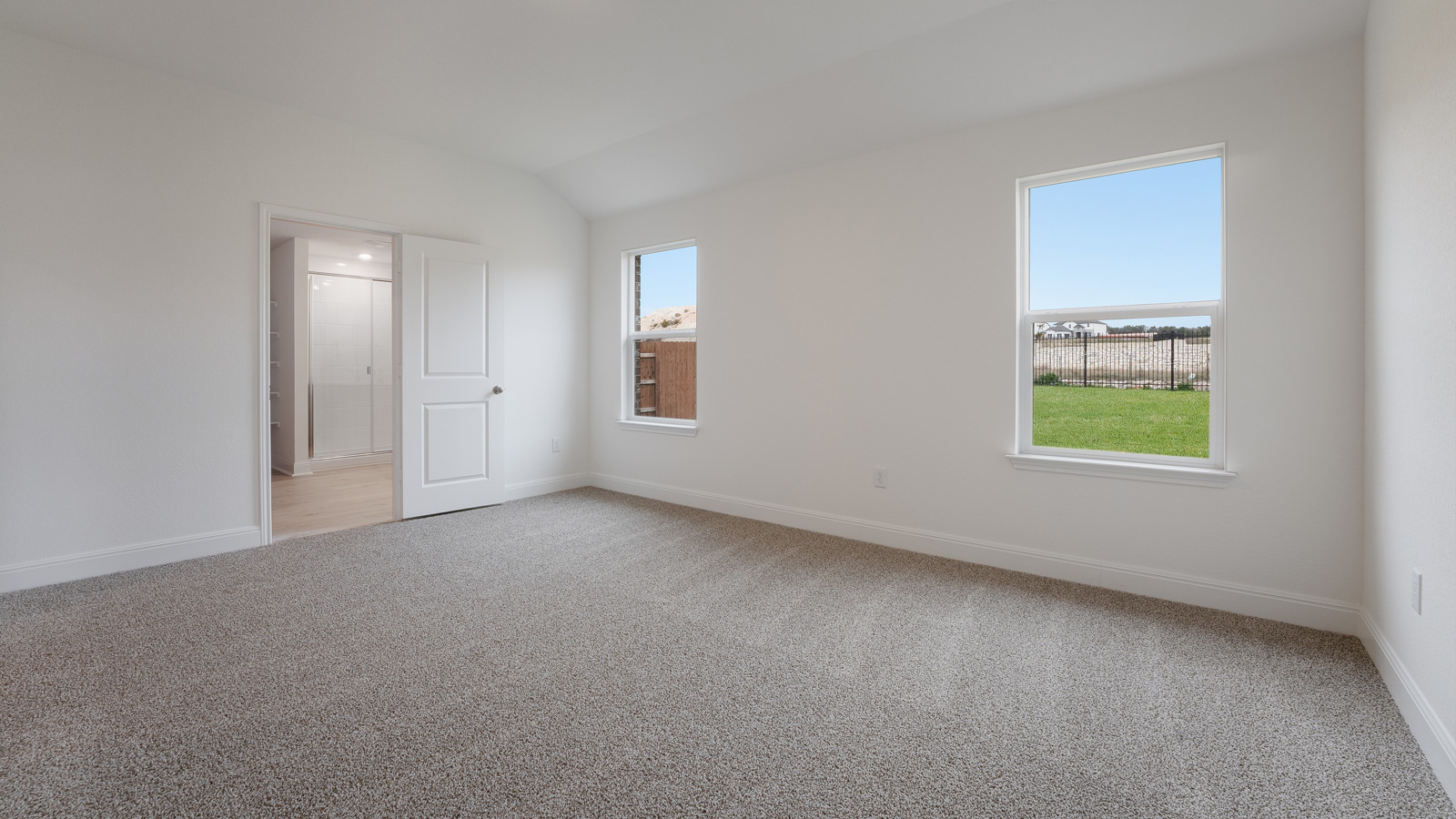 Large main bedroom, bedroom 1, located near the back of the home.