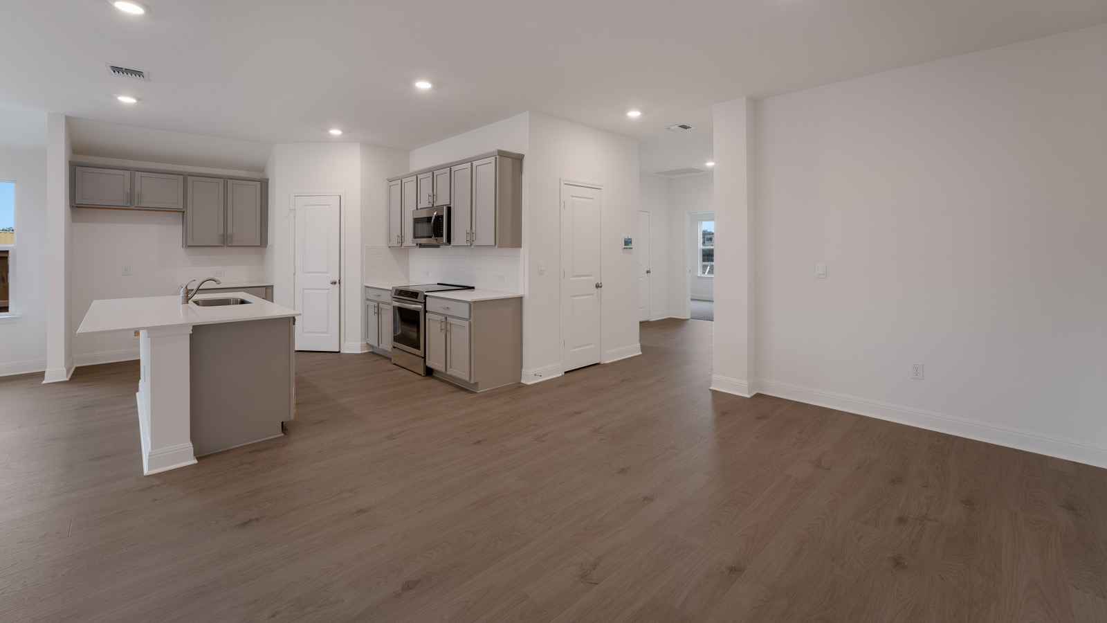 Open concept living room and kitchen.