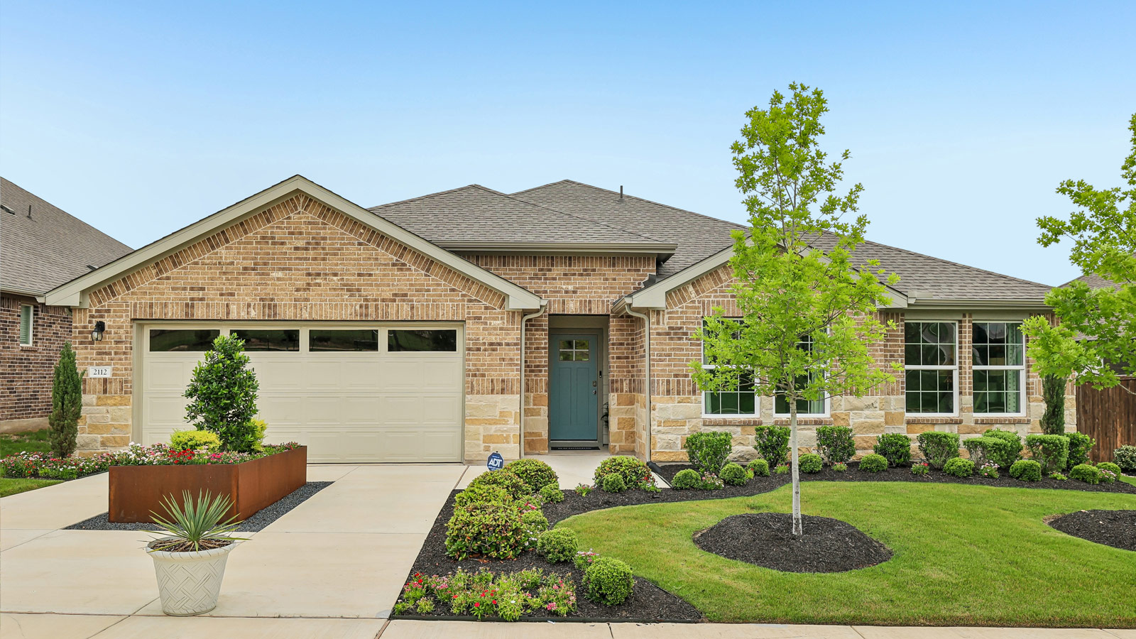 Exterior of the Irving floorplan at Riverview in Georgetown, TX.