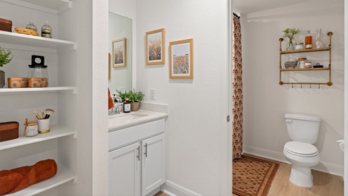 Bathroom 3 with bathtub and single vanity sink.