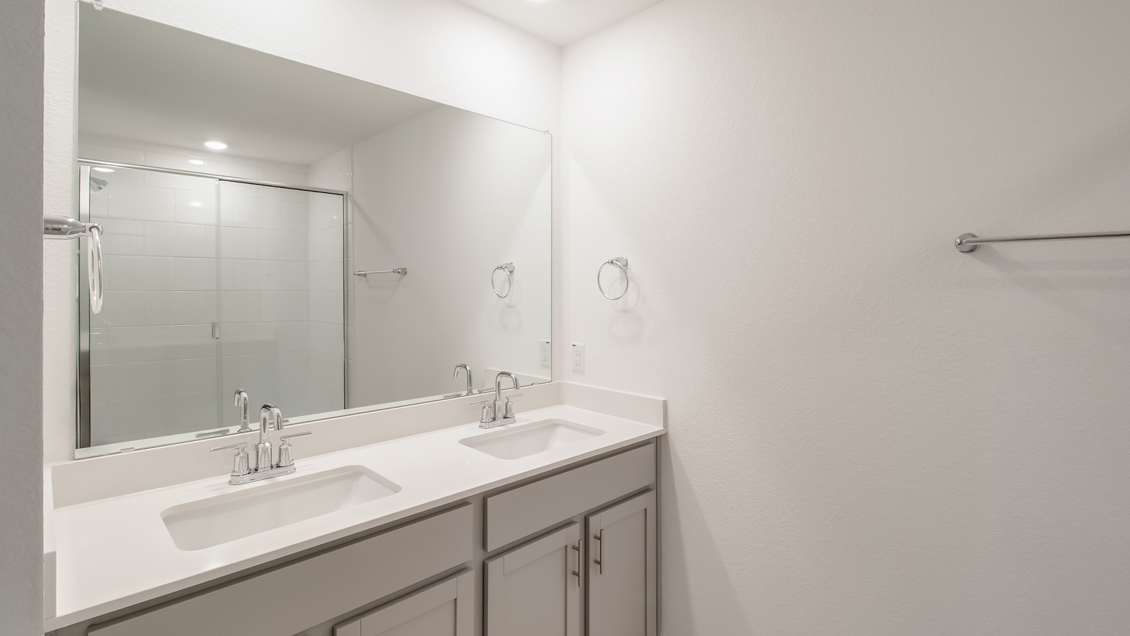 Bathroom 1 with double vanity sink.