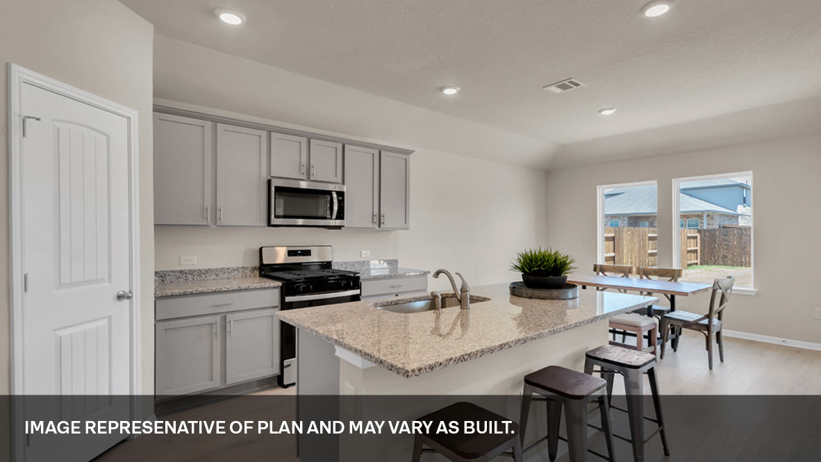Functional kitchen island adds a sink, multi-prep zones, cabintes and a pantry, new appliance suite, and outside access