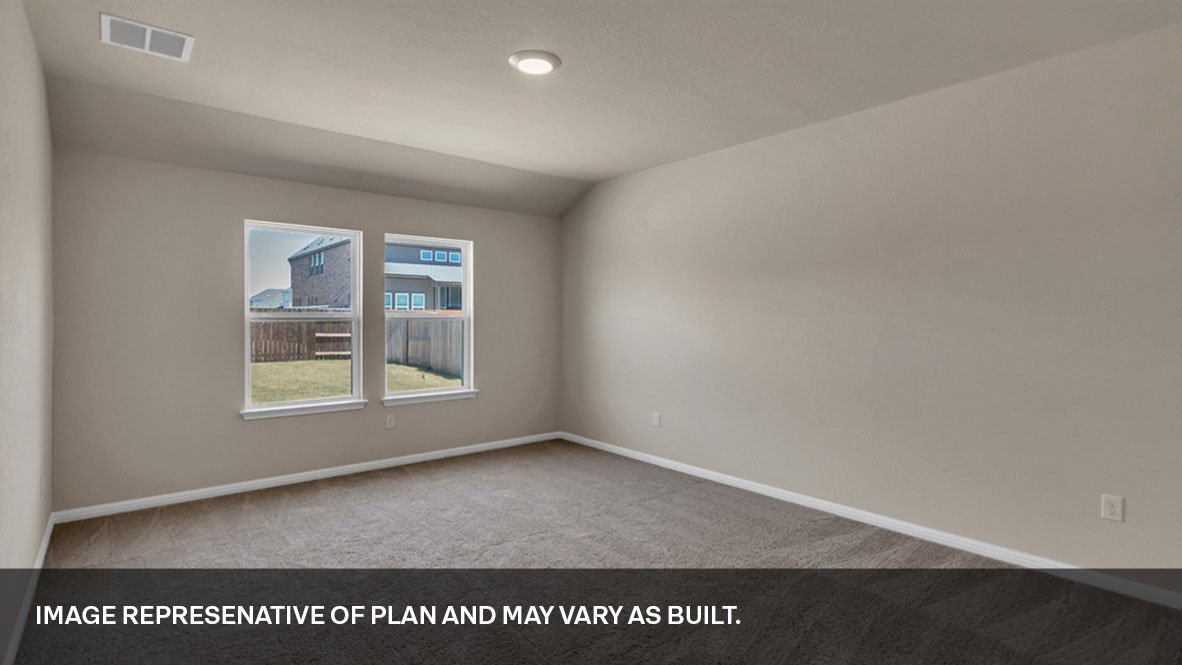 Primary bedroom features ample space, double windows, soft carpet, a stylish walk-in closet, and a private ensuite bath