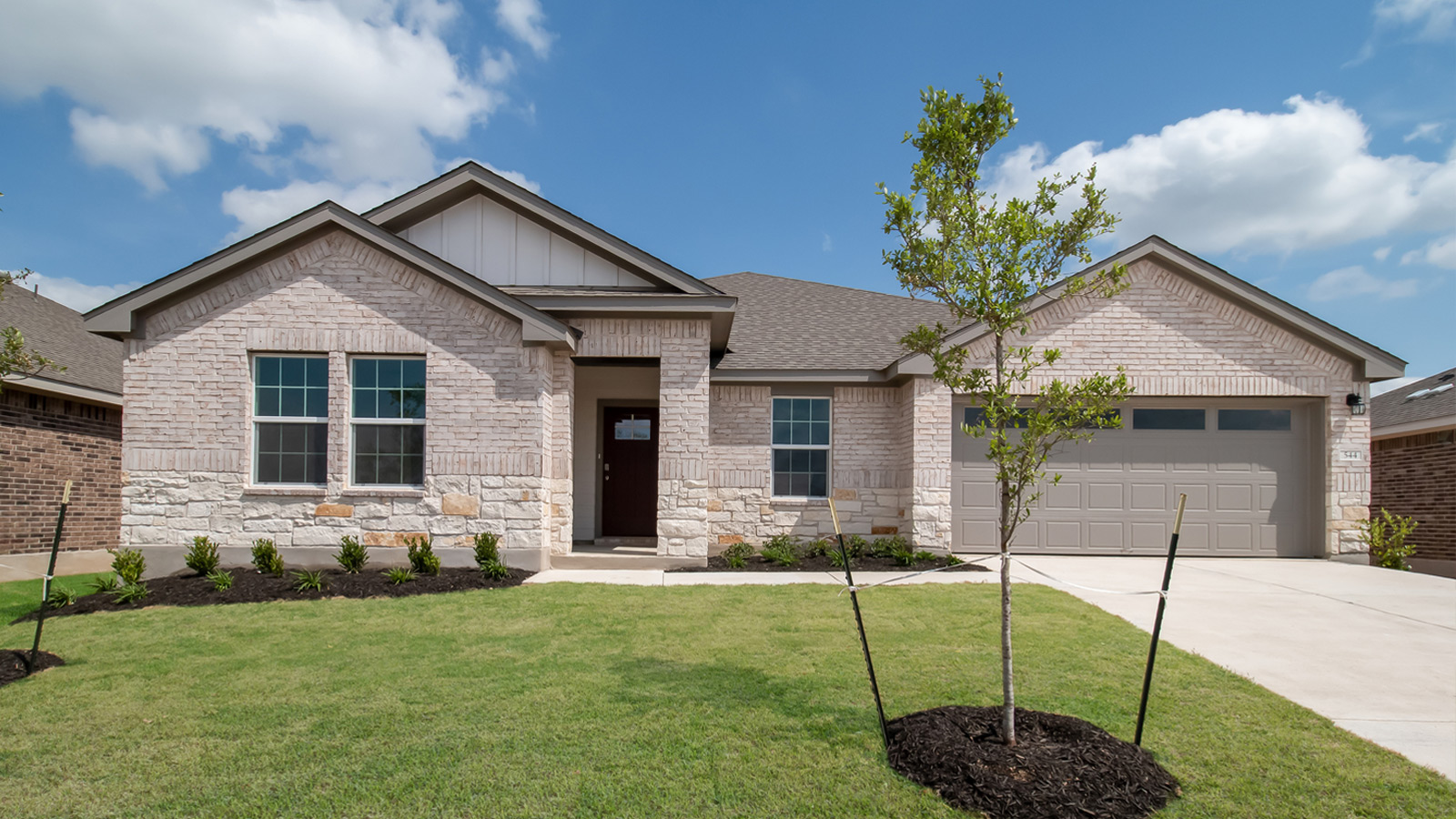 The Frisco Floorplan - B Elevation at Riverview in Georgetown, TX.