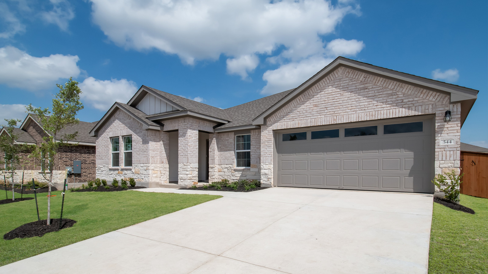 The Frisco Floorplan - B Elevation at Riverview in Georgetown, TX.