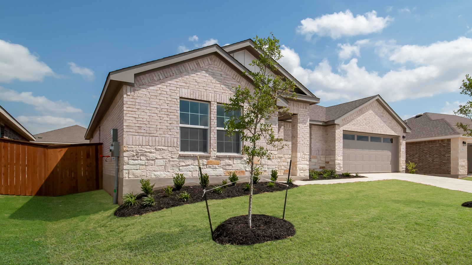 The Frisco Floorplan - B Elevation at Riverview in Georgetown, TX.