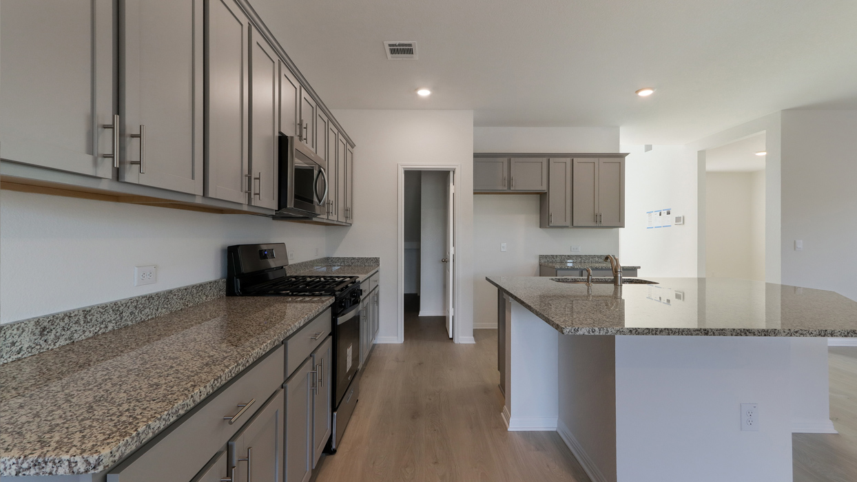 Kitchen with stainless steel appliances.