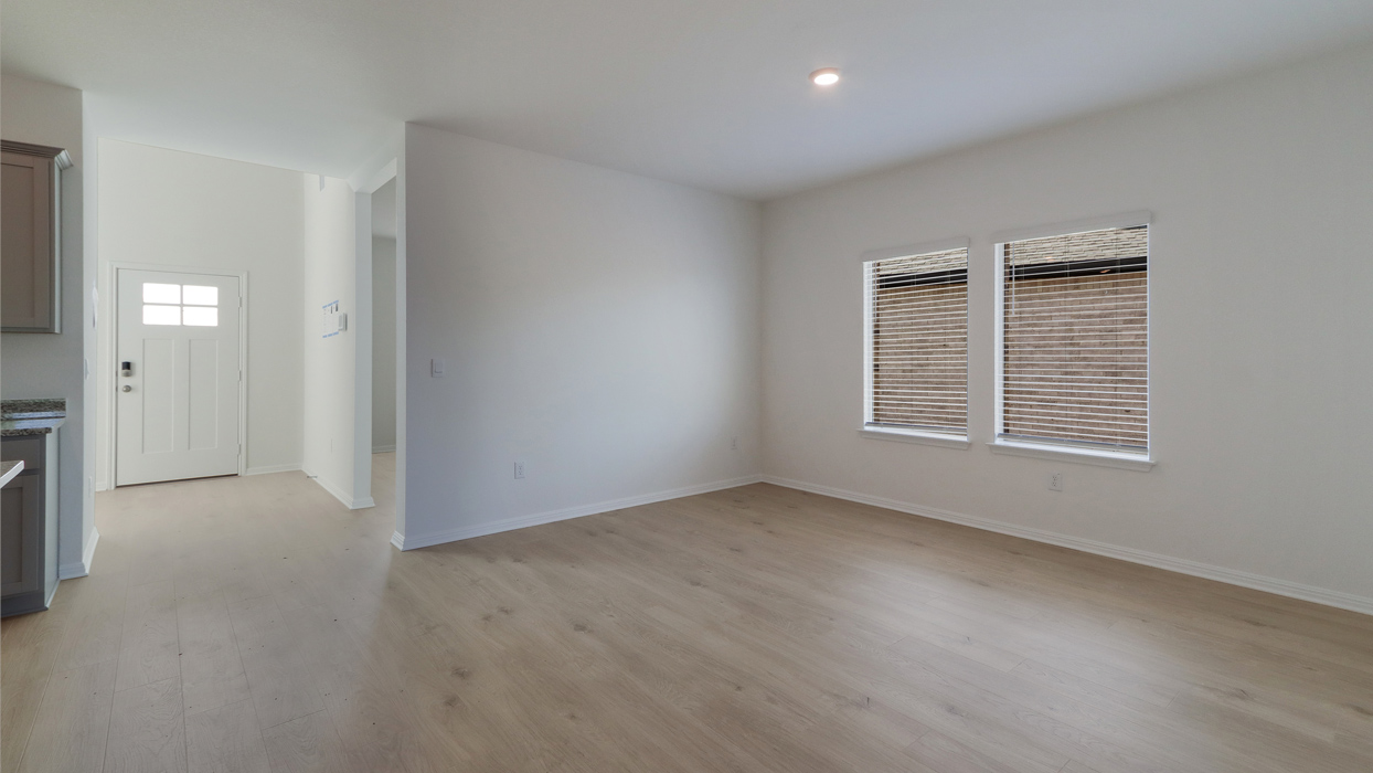 Optional dining are with a large window.