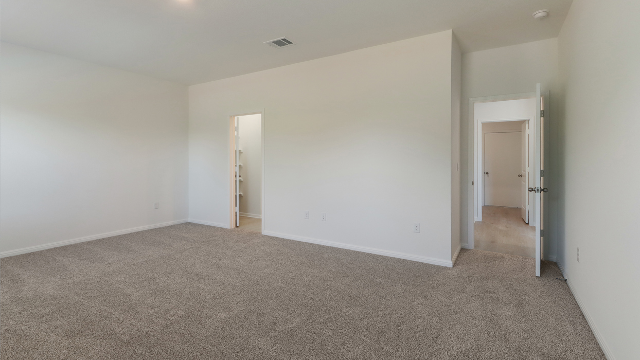 Primary bedroom with ensuite bathroom.