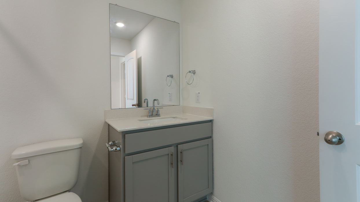 Bathroom with single vanity sink.