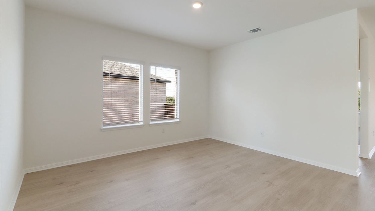 Flex room with large window for natural lighting.