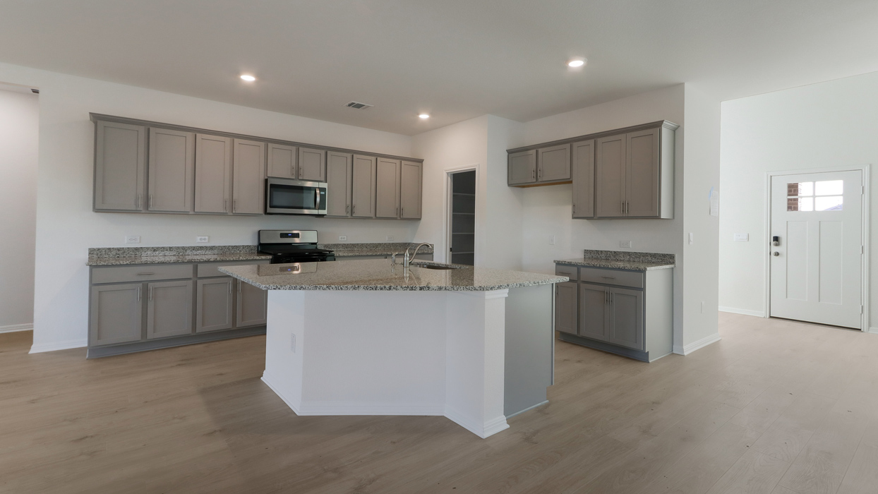 Open concept kitchen with large island.