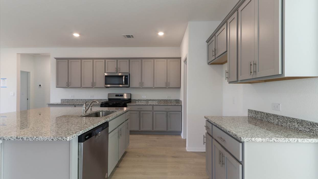 Kitchen with granite countertops.
