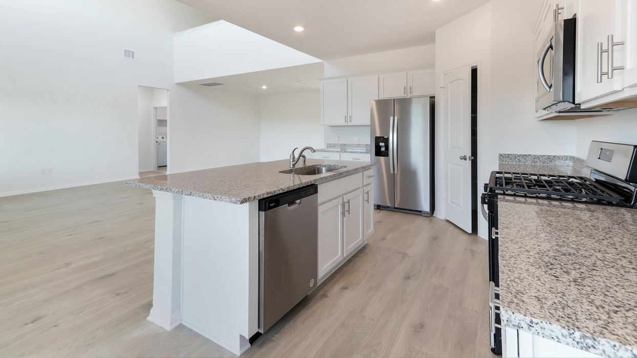 Kitchen with large walk in pantry.