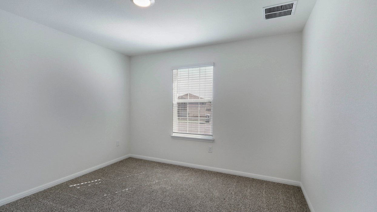 Bedroom with a single window.