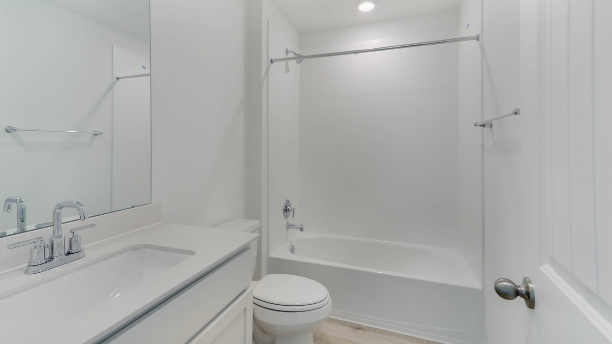 Bathroom with a single vanity sink.