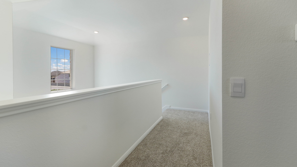 Upstairs loft area with access to downstairs.