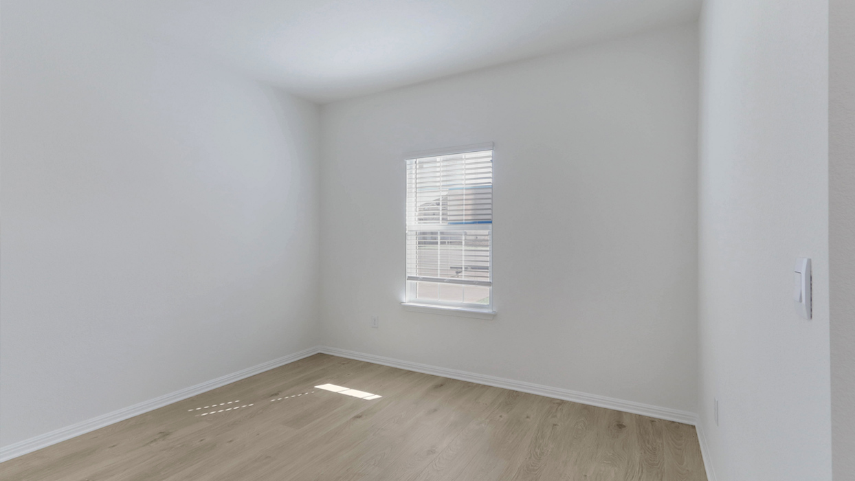 Optional flex room with a window and tile flooring.