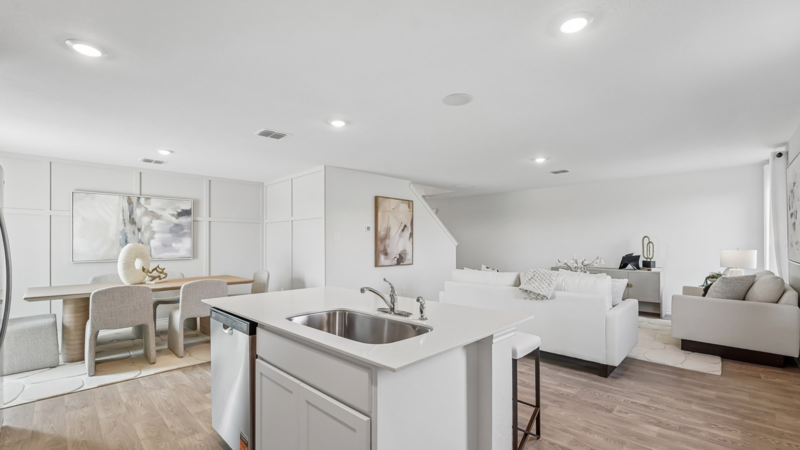 Quartz countertops in kitchen.