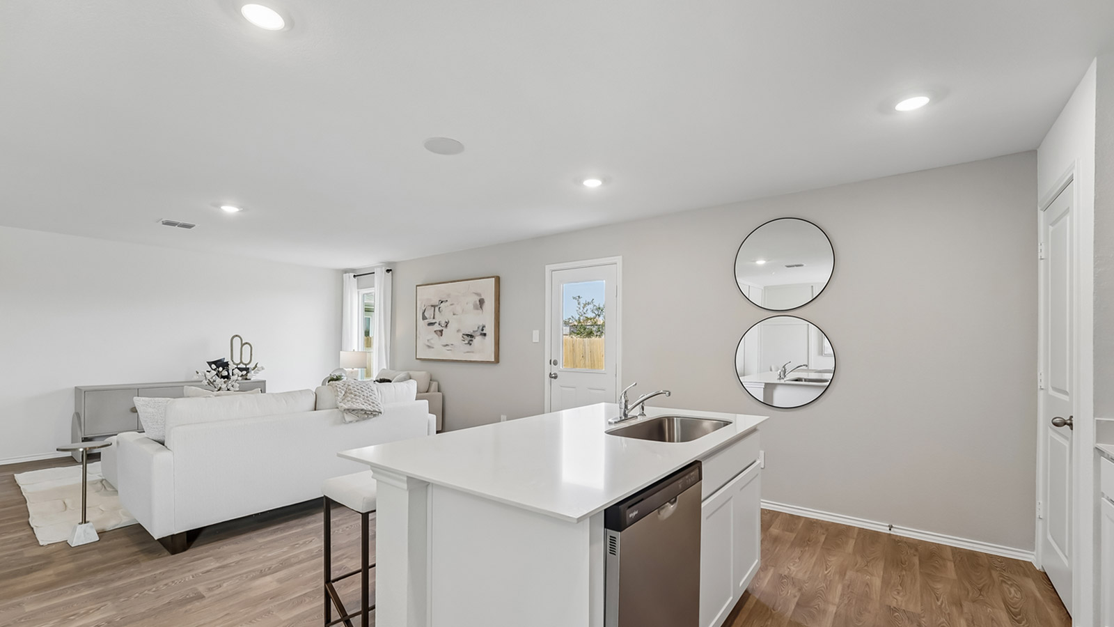 Quartz countertops in kitchen.