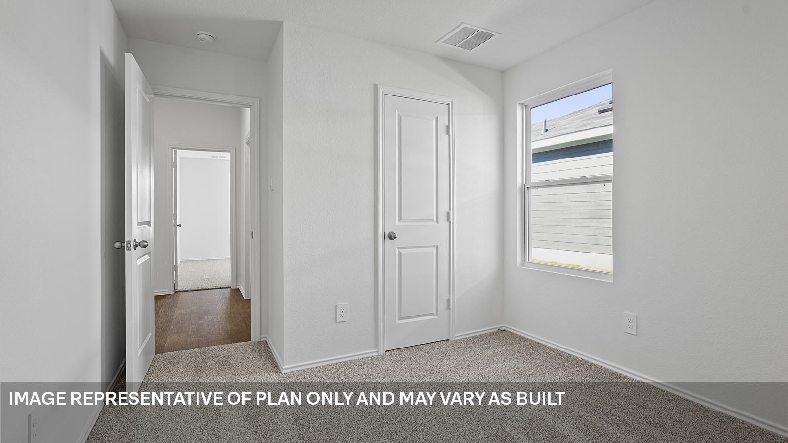 Bedroom three with window.