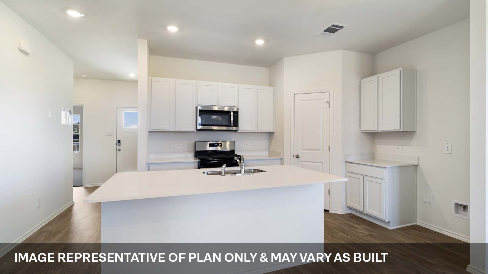 Kitchen with stainless steel appliances.