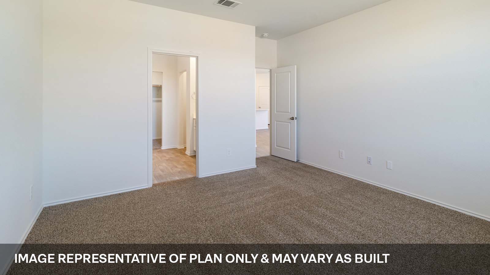 Bedroom 1 with carpeted flooring.