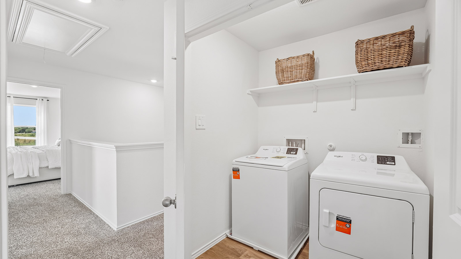 Utility room located off the staircase.