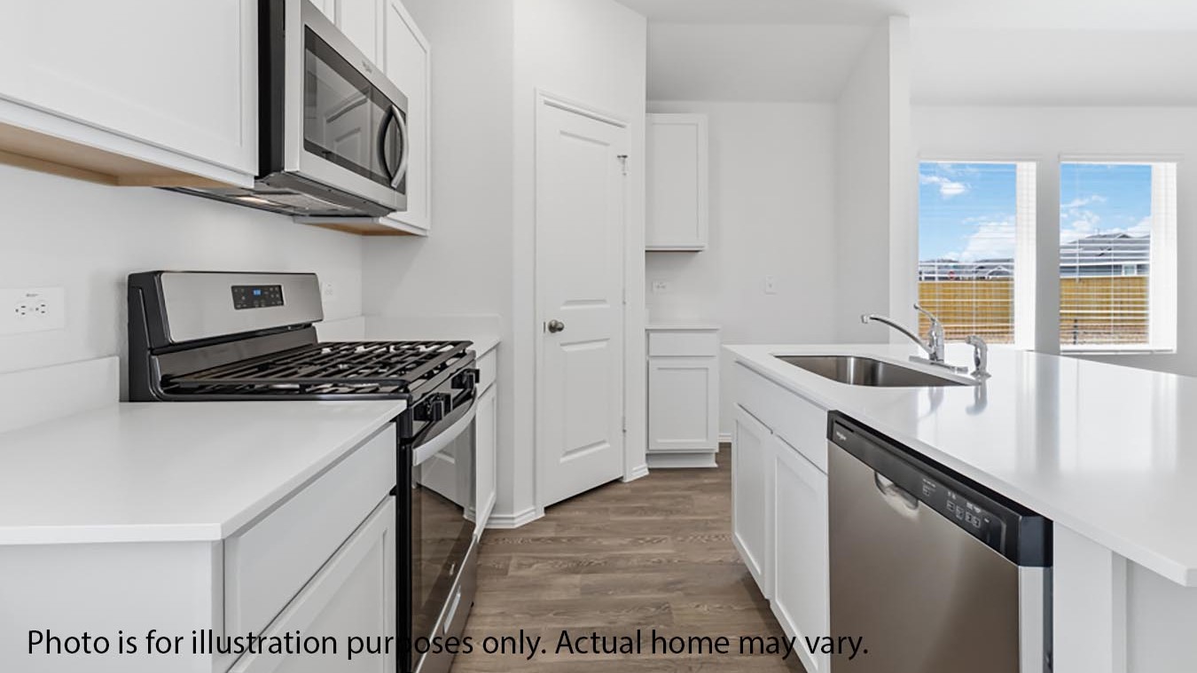 kitchen white countertops with island and stainless steel appliances