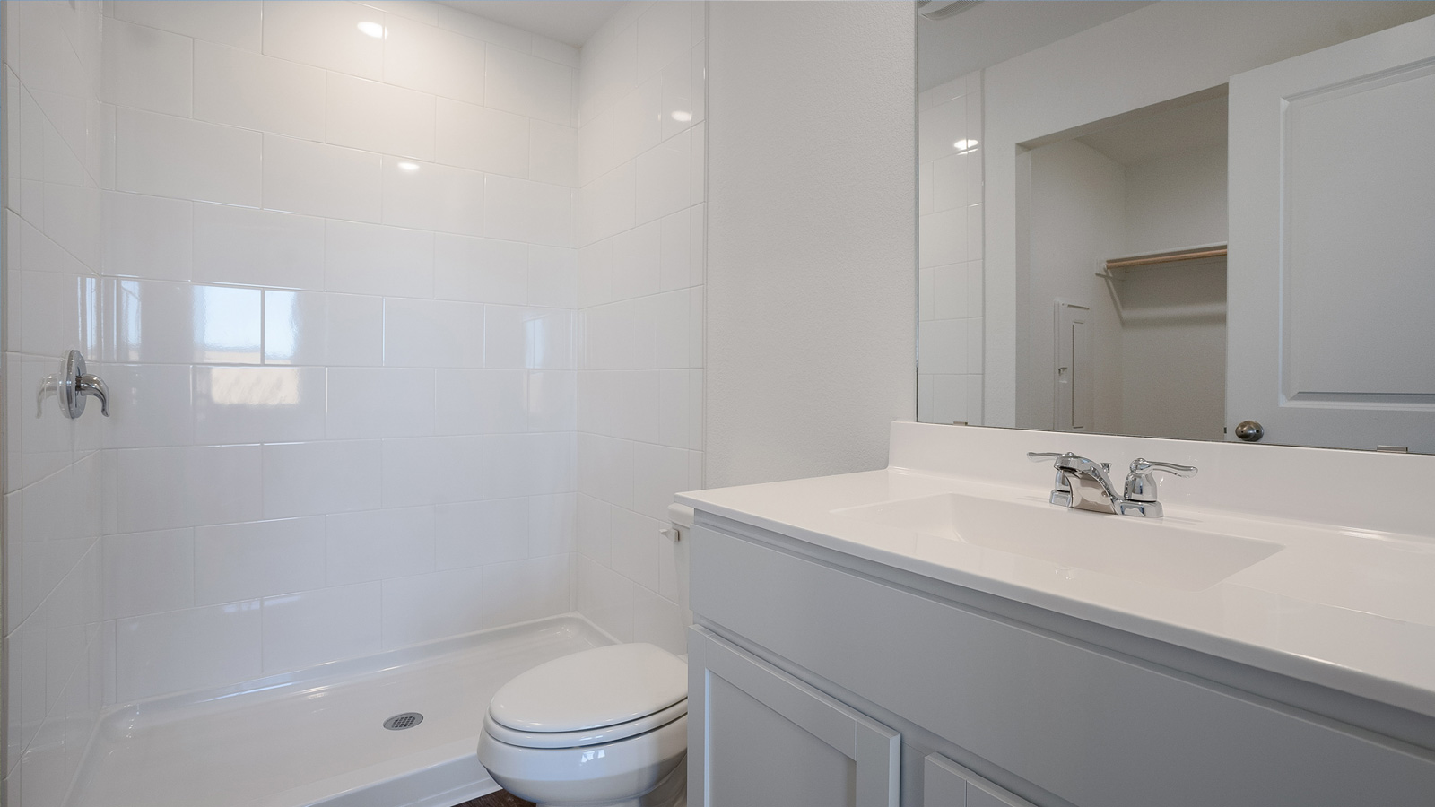 Bathroom 1 with single vanity sink and quartz countertops.