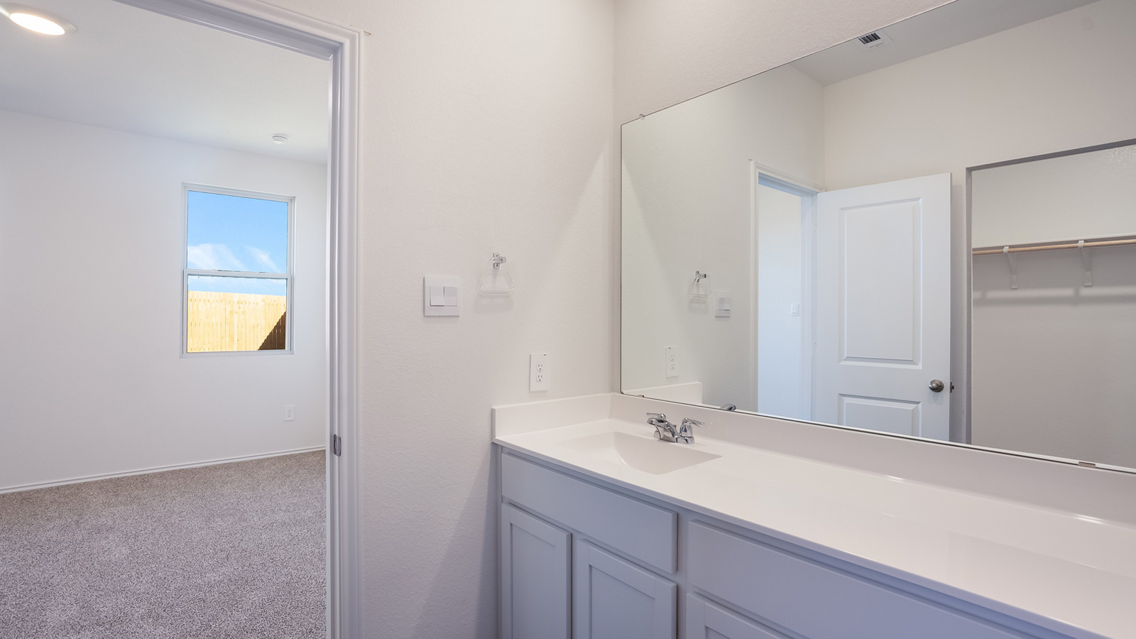Bathroom 1 with single vanity sink.