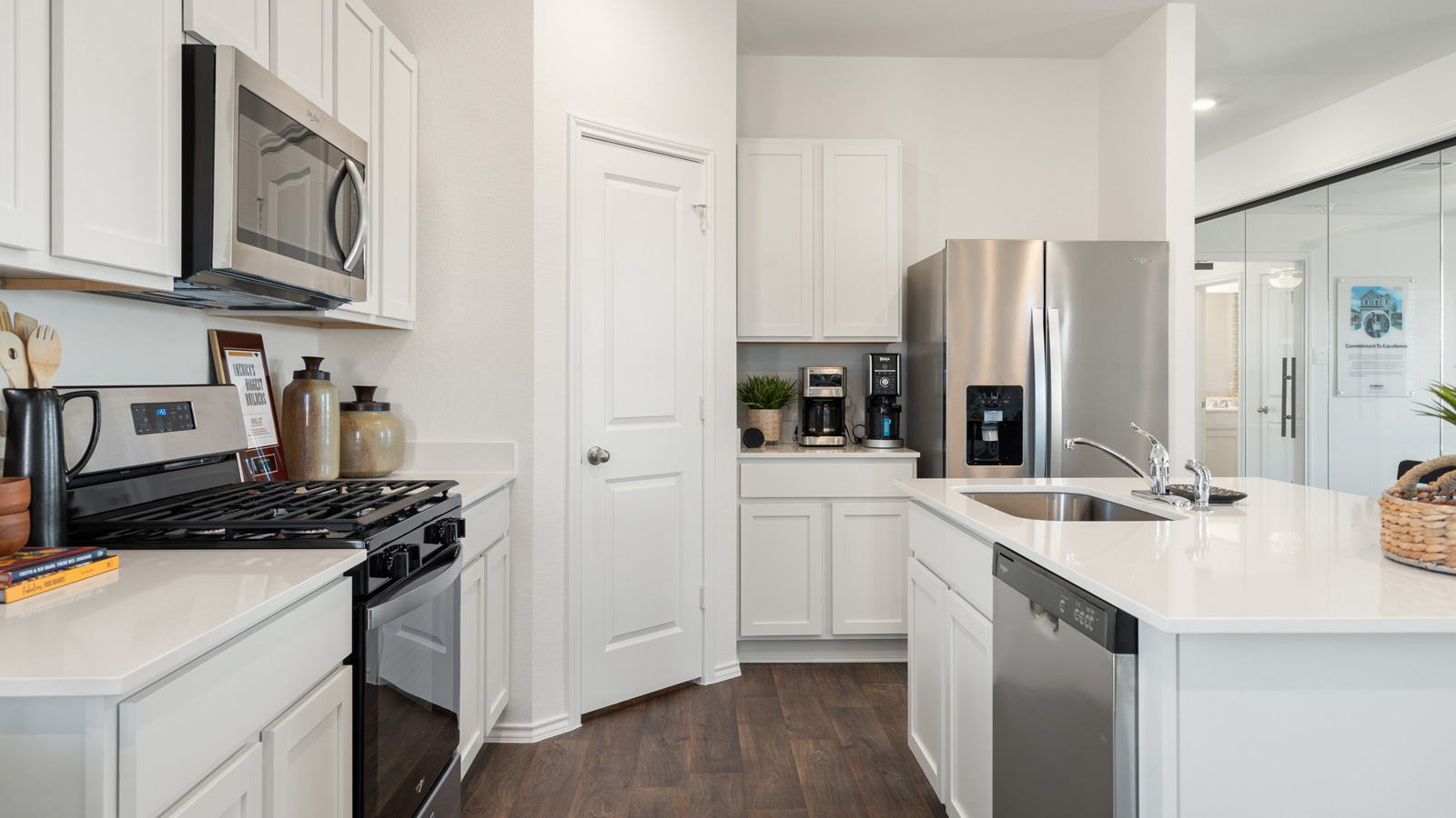 Stainless steel appliances in the kitchen.