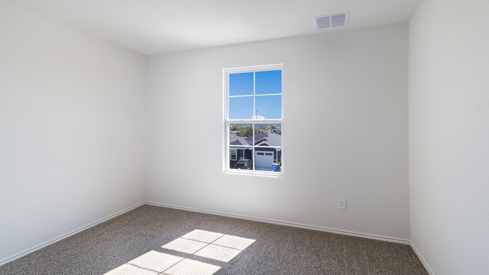 Bedroom 4 with carpeted flooring.