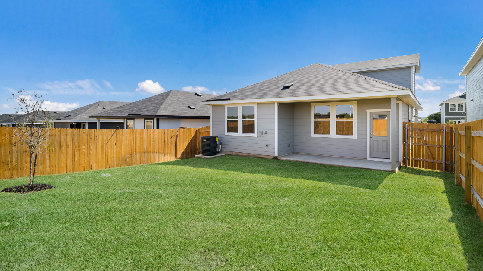 Back exterior of the Periwinkle floorplan in Kyle, TX.