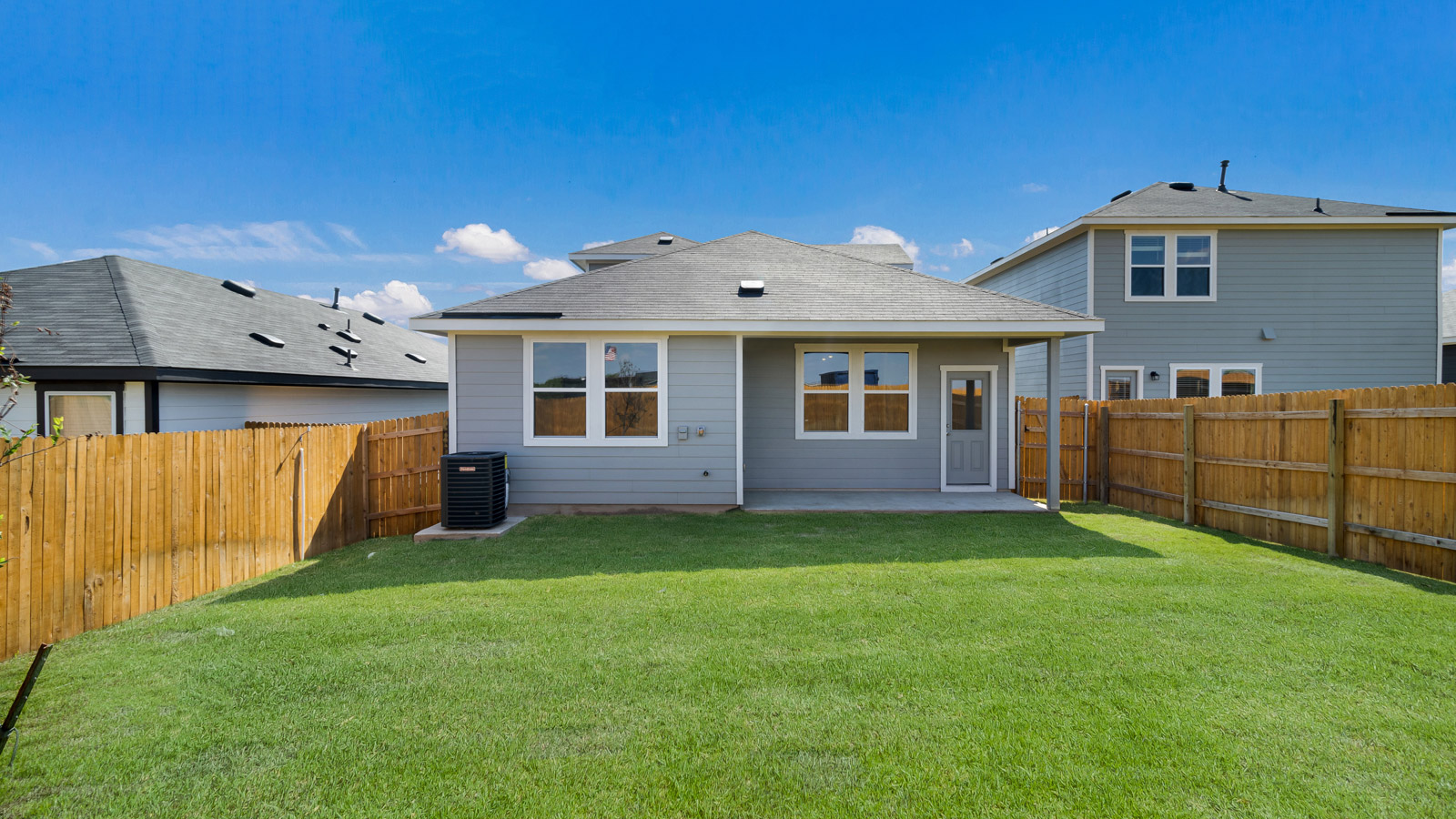 Back exterior of the Periwinkle floorplan in Kyle, TX.