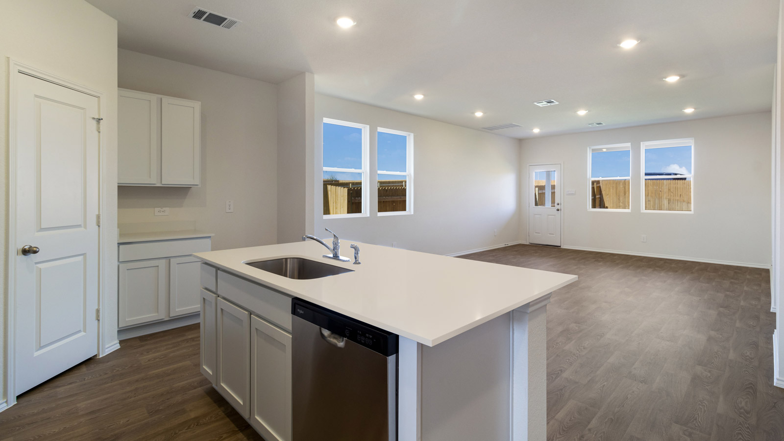 Kitchen with stainless steel appliances.